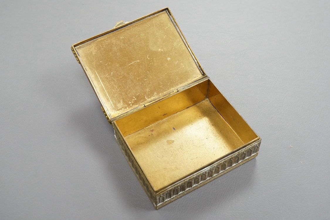 A 19th century French brass hinged box, with inset painted porcelain cover depicting the birth of Venus, 9cm wide. Condition - fair/good